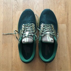 Green and gold Brooks running shoes